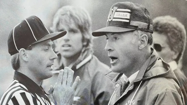 J.R. Bishop confers with an official